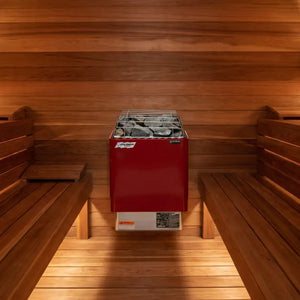 Red sauna heater in a wooden sauna room