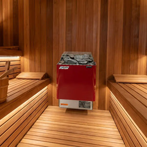 Red sauna heater in a wooden sauna room