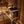 Homecraft H-Series Electric Sauna Heater Wooden sauna bench with a heater inside a wooden sauna room.