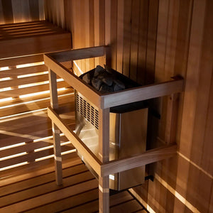 Homecraft H-Series Electric Sauna Heater Wooden sauna bench with a heater inside a wooden sauna room.