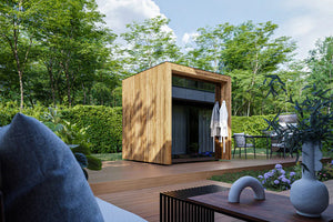Modern outdoor cabin with wooden exterior in a lush green garden