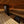 Wooden sauna interior with benches and glowing lights.